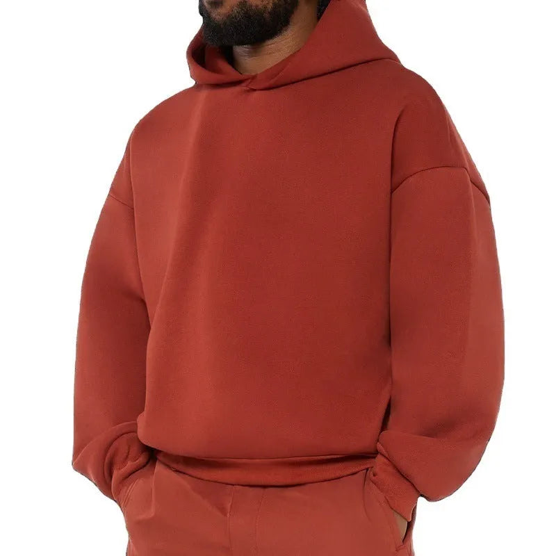 Men's grey fleece-lined cotton pullover hoodie with a wool lining and long sleeves