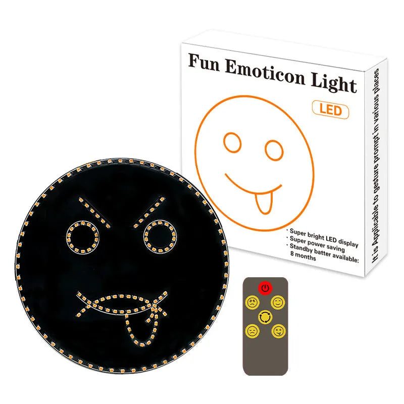 Black car rear window LED expression light showing orange smiley face display