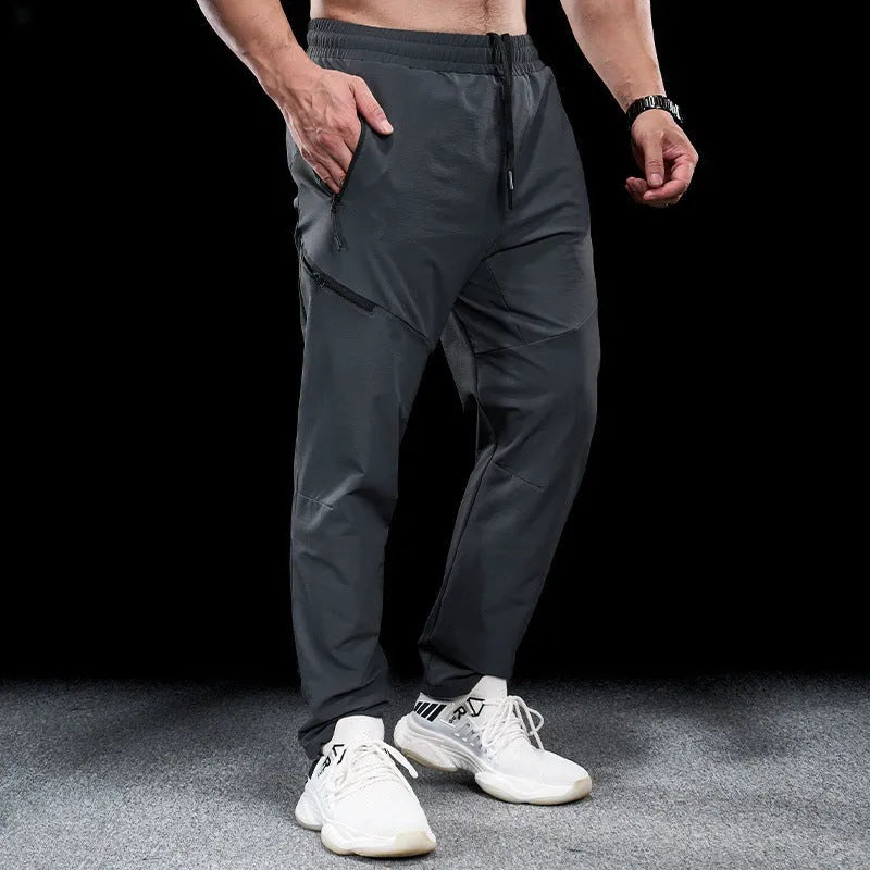 Men's waterproof quick-drying nylon workout trousers in multiple colour options
