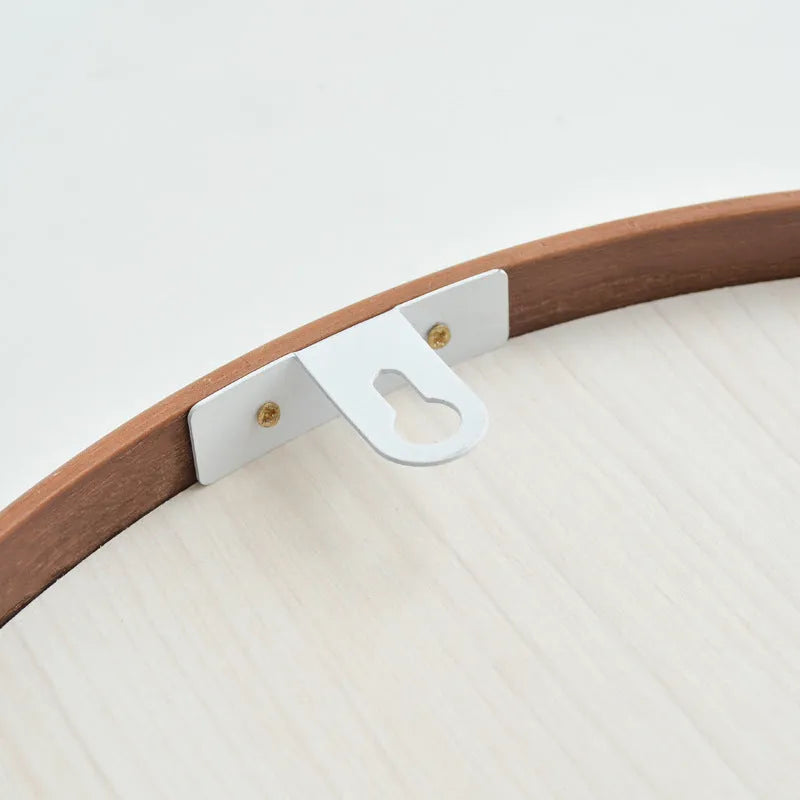 Round solid wood hanging mirror with walnut finish and float silver surface, 30cm diameter
