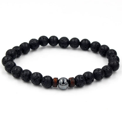 A stylish and durable men's bracelet made with volcanic stone, flash stone, and wood chips