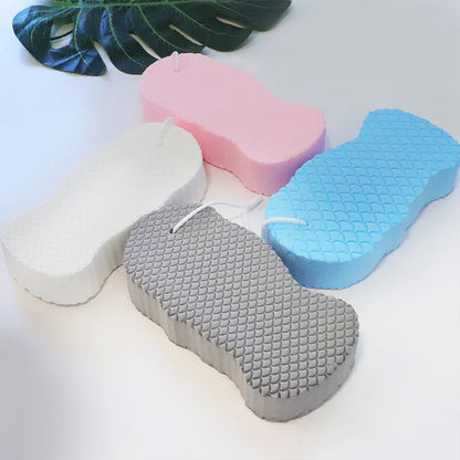 3D fish scale pattern bath sponge in white, grey, pink, or light blue for gentle exfoliation