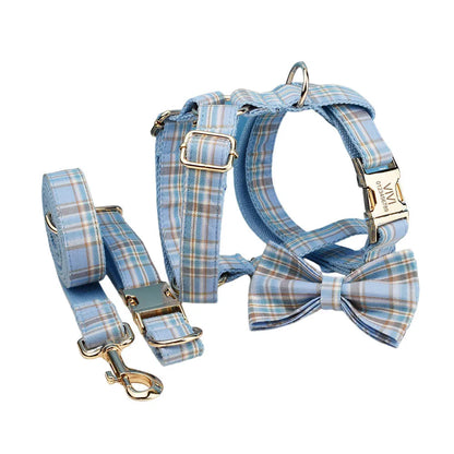 Sky blue grid forest pattern dog collar, leash, bow, and vest four-piece pet accessory set