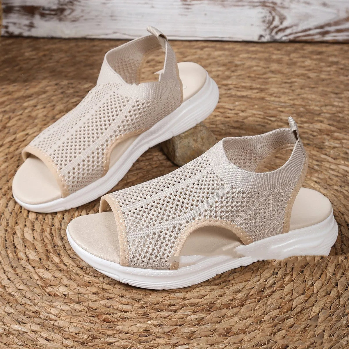Women's black platform sports sandals with a flat toe and rubber sole on a light background