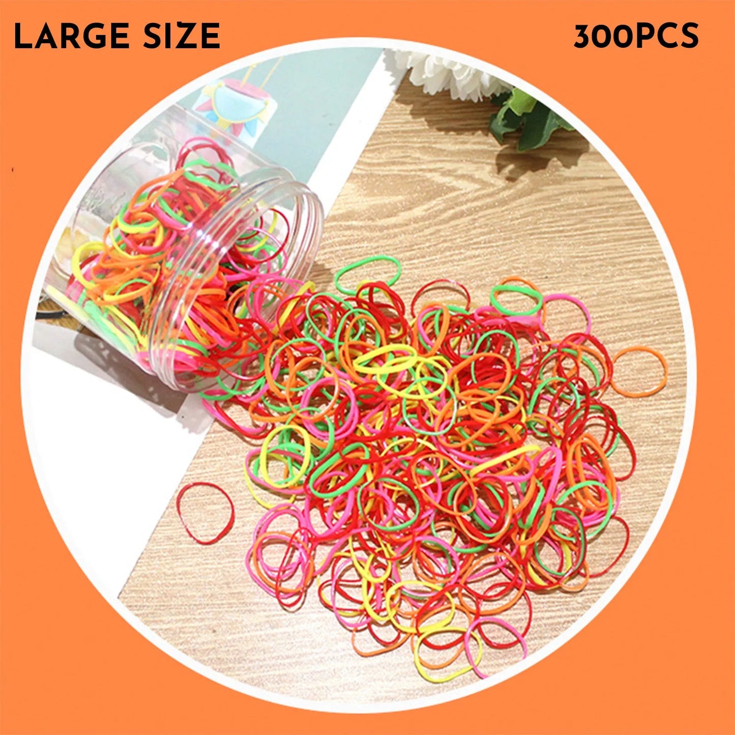Assorted colourful thin TPU baby hair ties for toddlers and kids in a reusable plastic storage container.