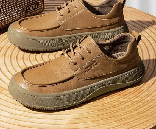 Retro brown leather lace-up casual shoes for men with visible stitching and a rubber sole.