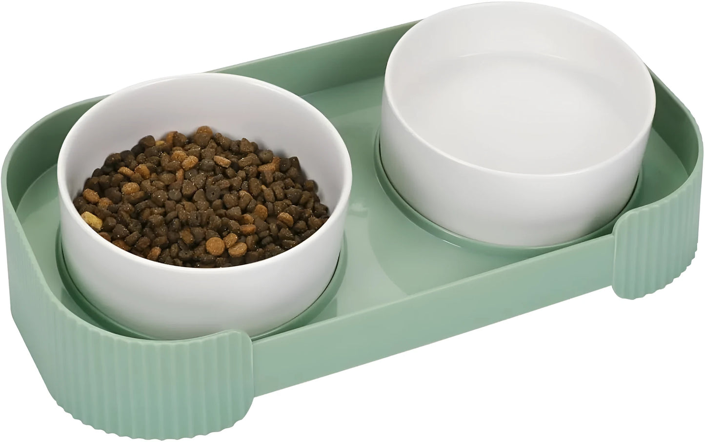 Green ceramic elevated cat bowl set with two tilted dishes on a stand with a spill-proof rim
