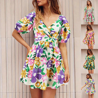 Stylish floral mini dress with V-neck and lantern sleeves, perfect for summer vacations and beach outings