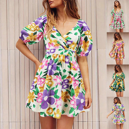 Stylish floral mini dress with V-neck and lantern sleeves, perfect for summer vacations and beach outings