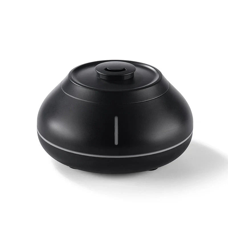 Aroma Humidifier with flickering flame-like effect and vibrant LED lighting, creates a calming, fragrant atmosphere in the home