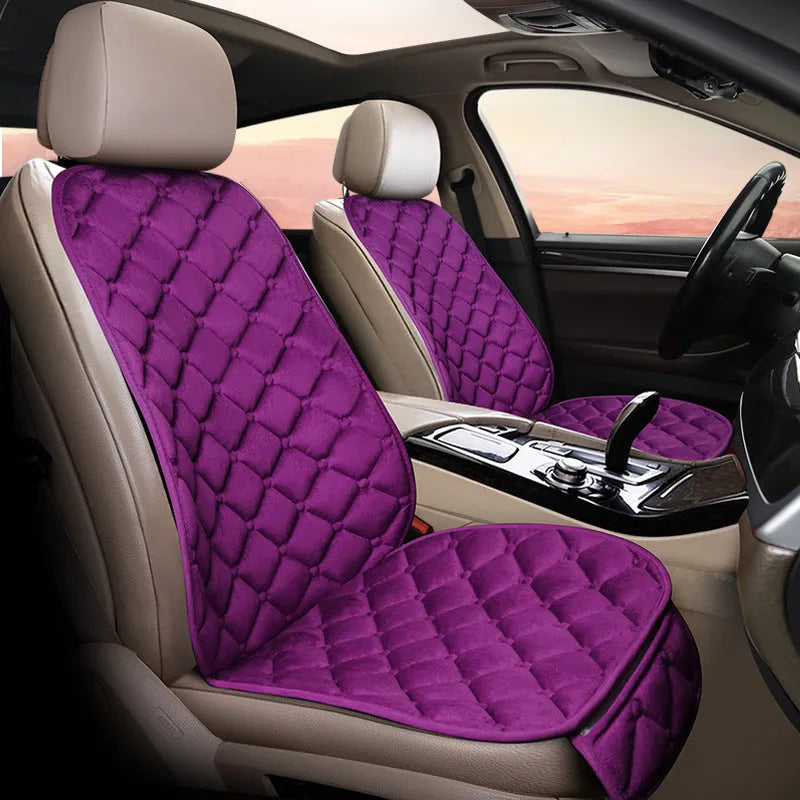 Ringer plush cotton car seat cushion in burgundy colour on a car seat.