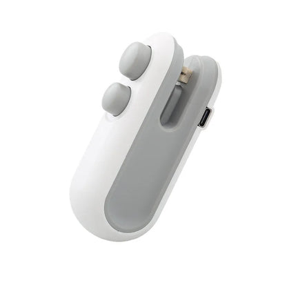 Handheld white heat sealer with magnetic back and cutter blade for sealing food bags