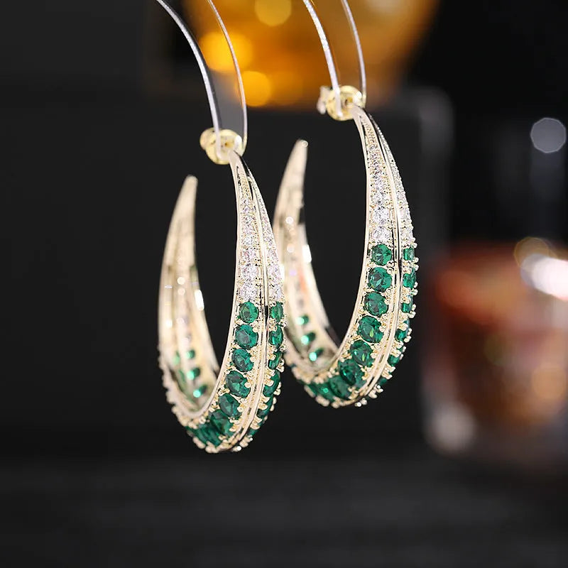 Women's geometric copper hoop earrings in gold white zirconium finish, showing 4.3 cm by 4.5 cm drop shape.
