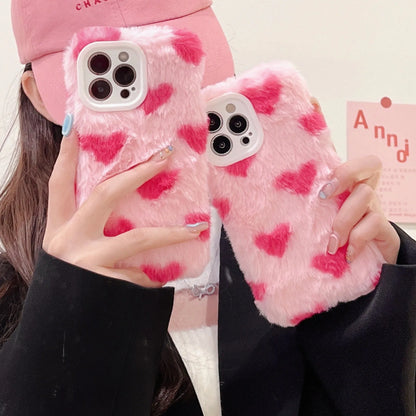 Pink silicone iPhone case with a cartoon design on the back