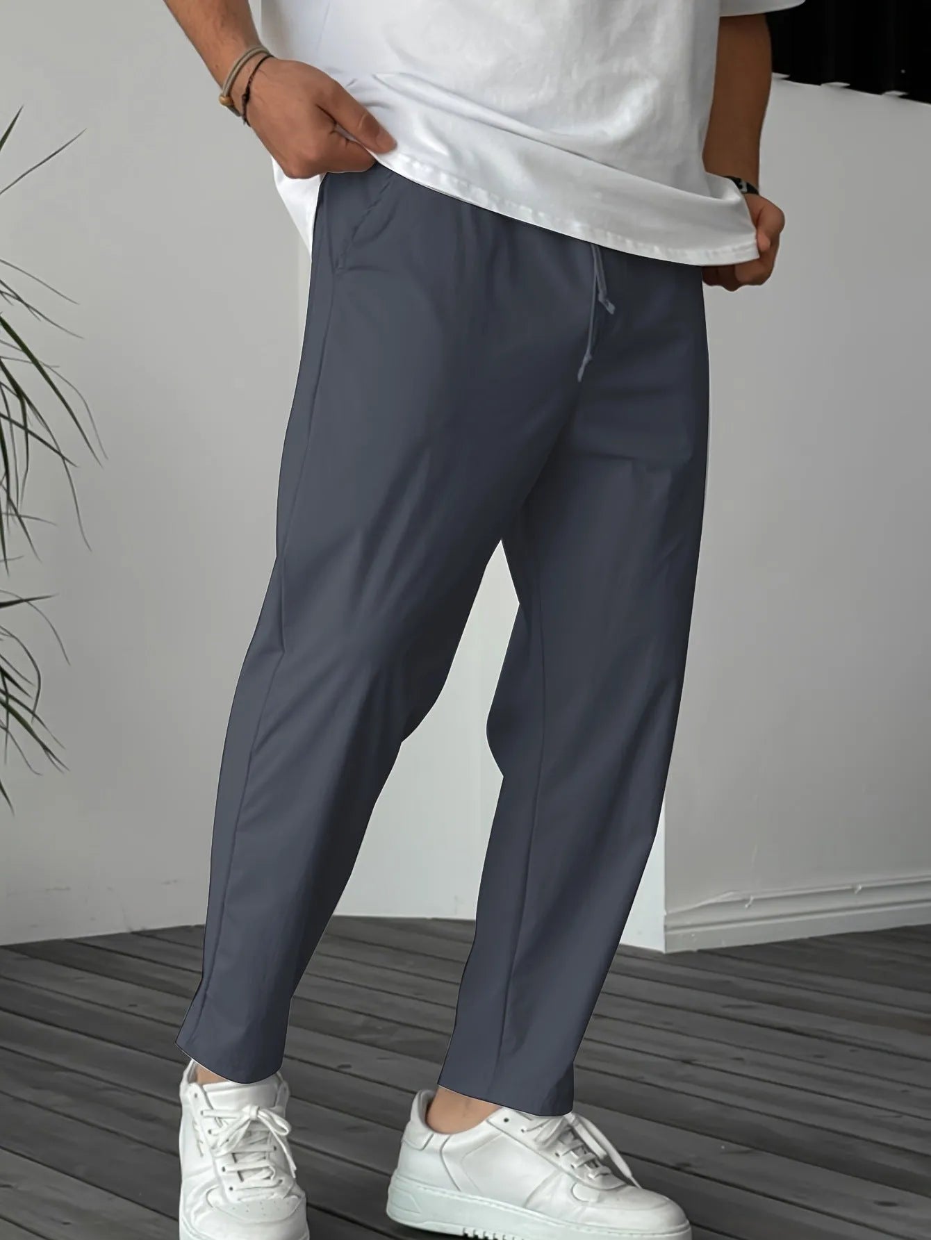 Men's khaki drawstring trousers with ribbon-trim pockets and straight-leg fit