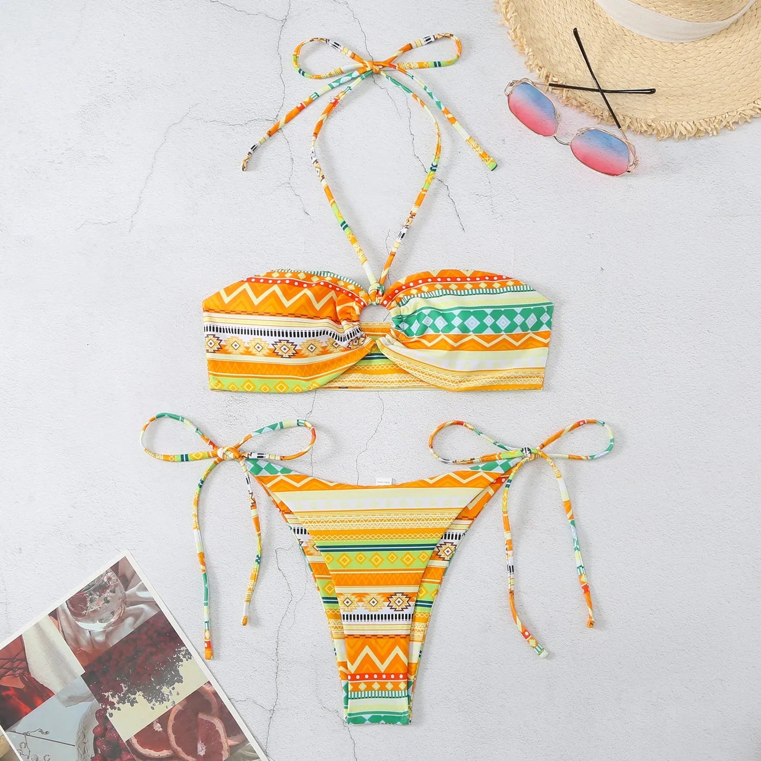 Halter women's split bikini swimsuit in polyester fabric showing colour options and halter neckline design