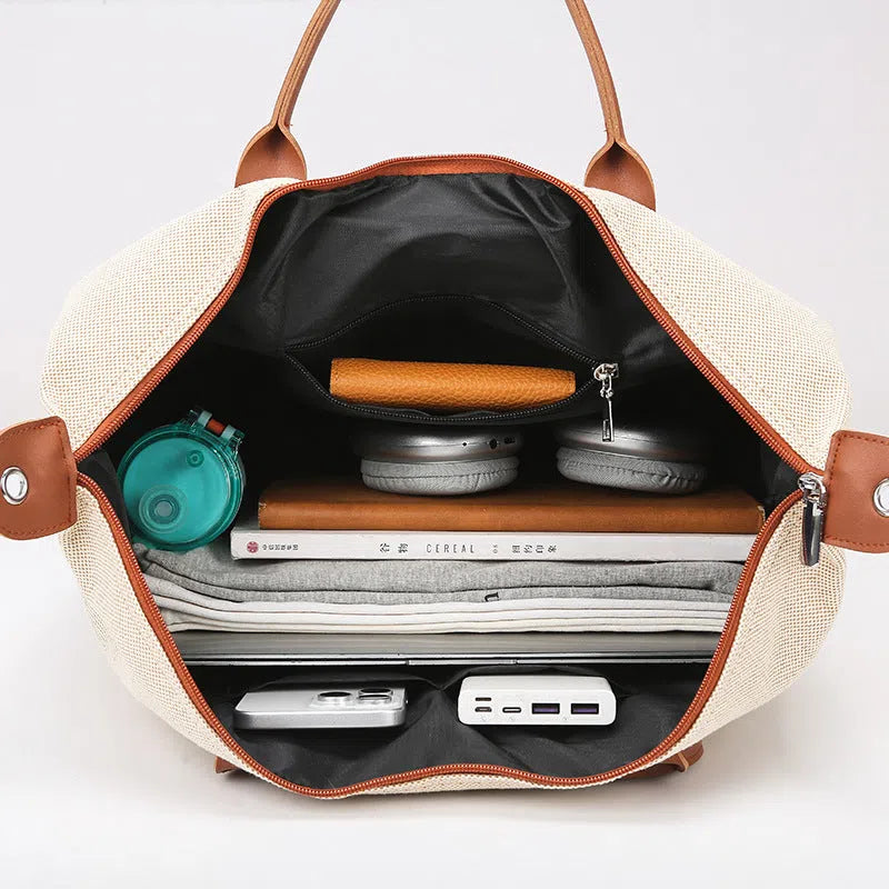 Large capacity canvas yoga and fitness bag in brown, khaki, or black with polyester lining and shoulder strap.