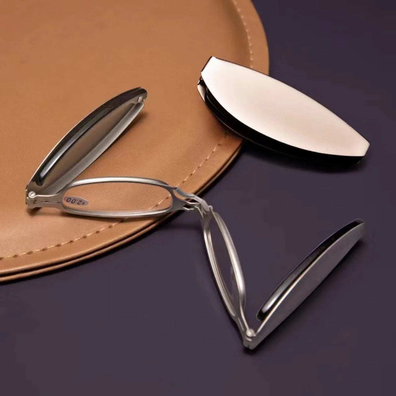 Black folding presbyopic glasses for men in a retro style with ring detailing.