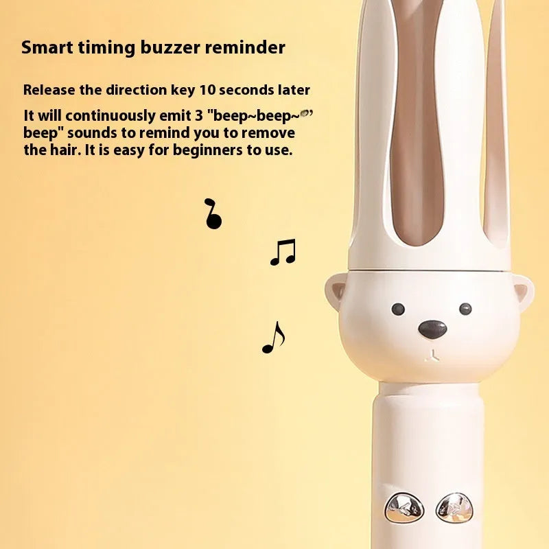 Beige automatic hair curler machine with negative ion technology and included styling stick on a table.