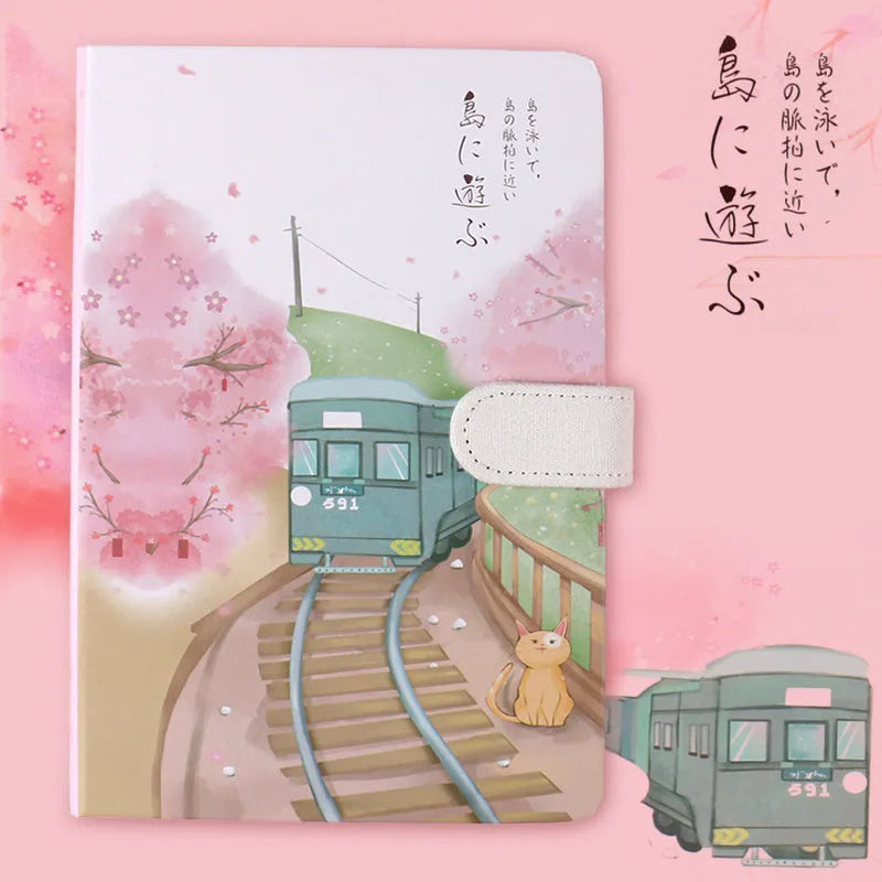 A5 wire-bound retro style notebook with colourful illustrated cover, shown with included pen.