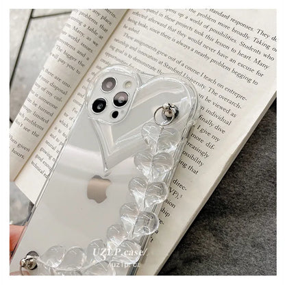Transparent TPU iPhone case with love bracelet heart chain design on a mobile phone.