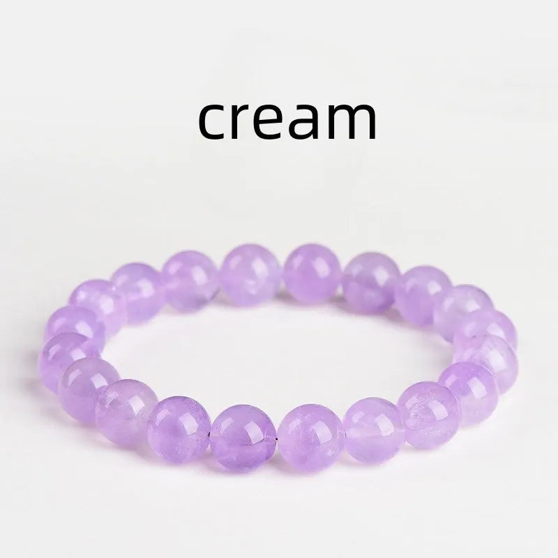 Lavender amethyst bracelet with water ripple design on beads, showing cream body and transparent colour options