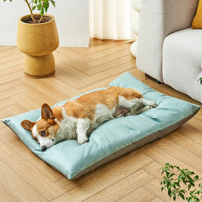 Blue and coffee coloured rectangular pet cooling mat shown in small, medium, large, and extra-large sizes.