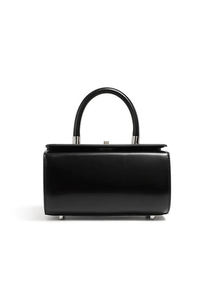 Women's leather one-shoulder crossbody bag in cowhide with clamshell design and internal phone pocket