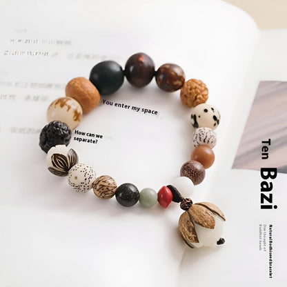 Women's 18-seed Bodhi seed bracelet with geometric pattern measuring 16cm wrist circumference
