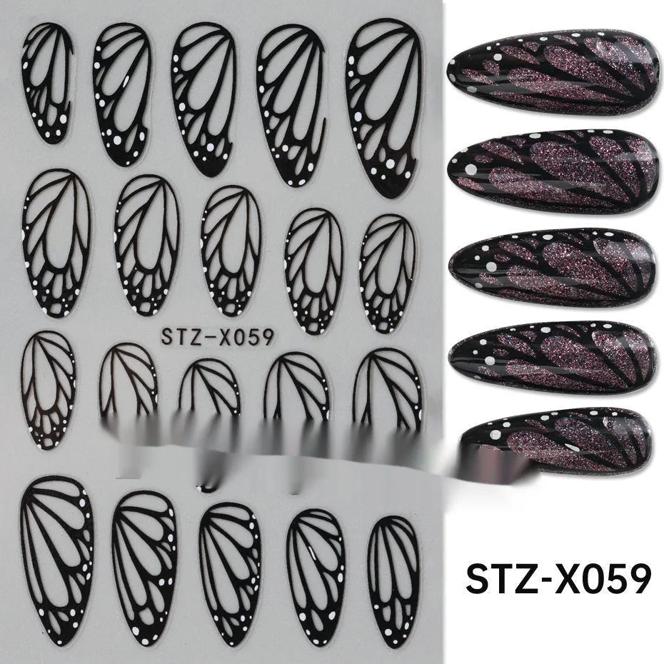 Assortment of black and silver nail sticker designs including cartoon and French tip patterns on a plastic sheet.