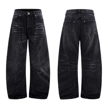 Men's black straight-leg jeans featuring a distinctive lightning crack washed pattern on the denim.