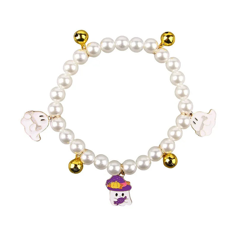 Three pearl necklaces with bells for pet Halloween costumes and decoration