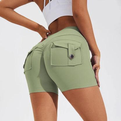 Women's high-waist quick-dry fitness shorts with side pockets in avocado green colour