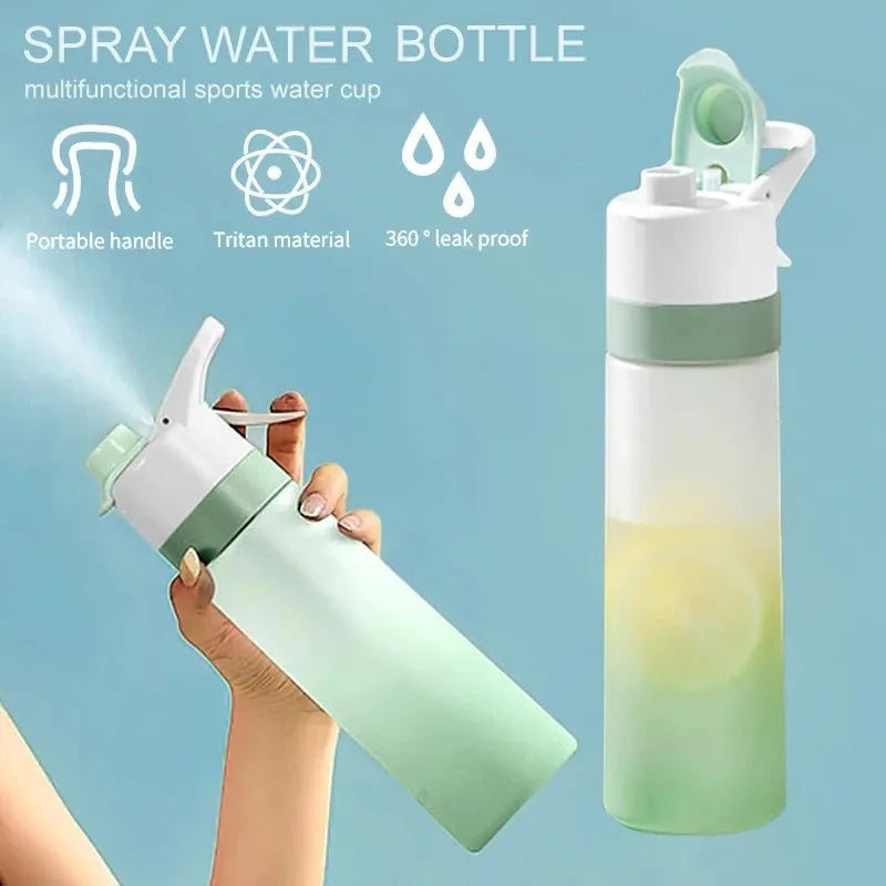 White spray water bottle with black leakproof lid and handle strap on a table