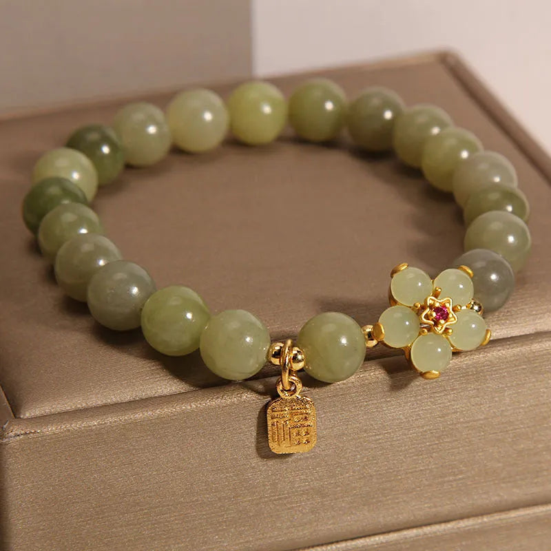 Bracelet for women in grey jade colour made from alloy metal with a casual style design, a simple and minimalist wrist accessory suitable for everyday wear and casual outfits