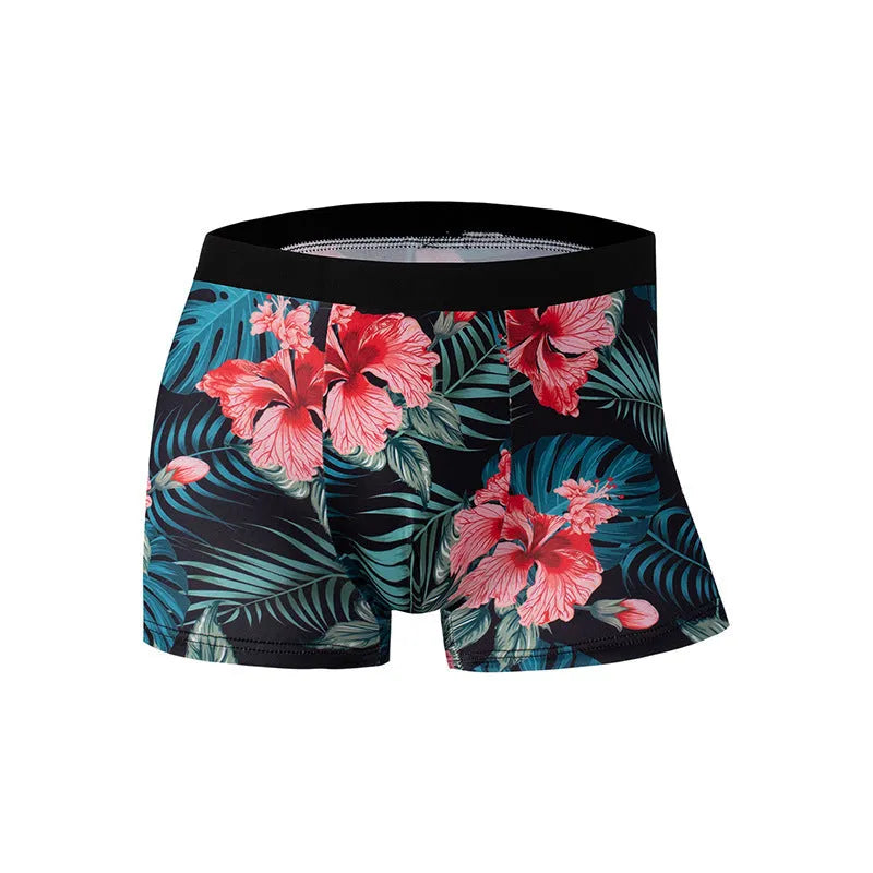 Men's printed ice silk underwear briefs in a floral design, showing mid-waist fit.