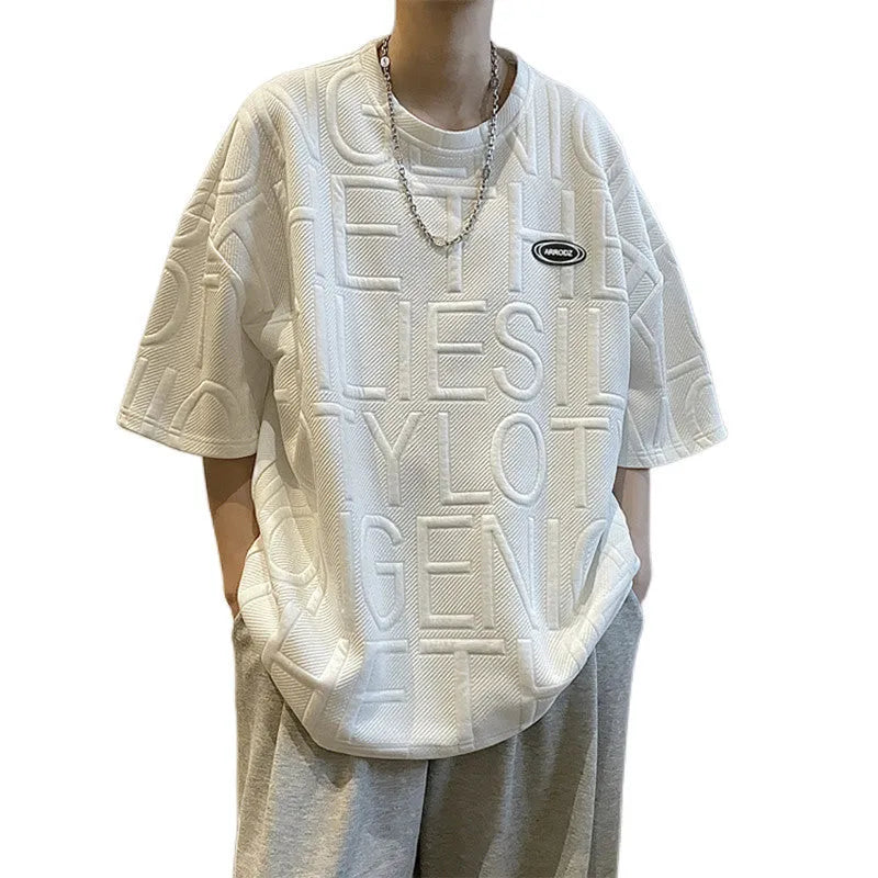 Grey men's short sleeve T-shirt with a raised retro letter design on the front.