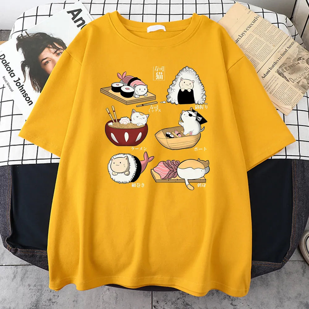 Man wearing a black loose-fit cotton t-shirt with a colourful cute cat sushi cartoon print on the front.