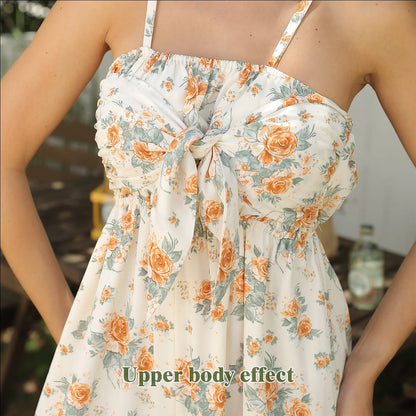 Elegant printed dresses in white colour, featuring various floral and geometric patterns, suitable for British women's fashion