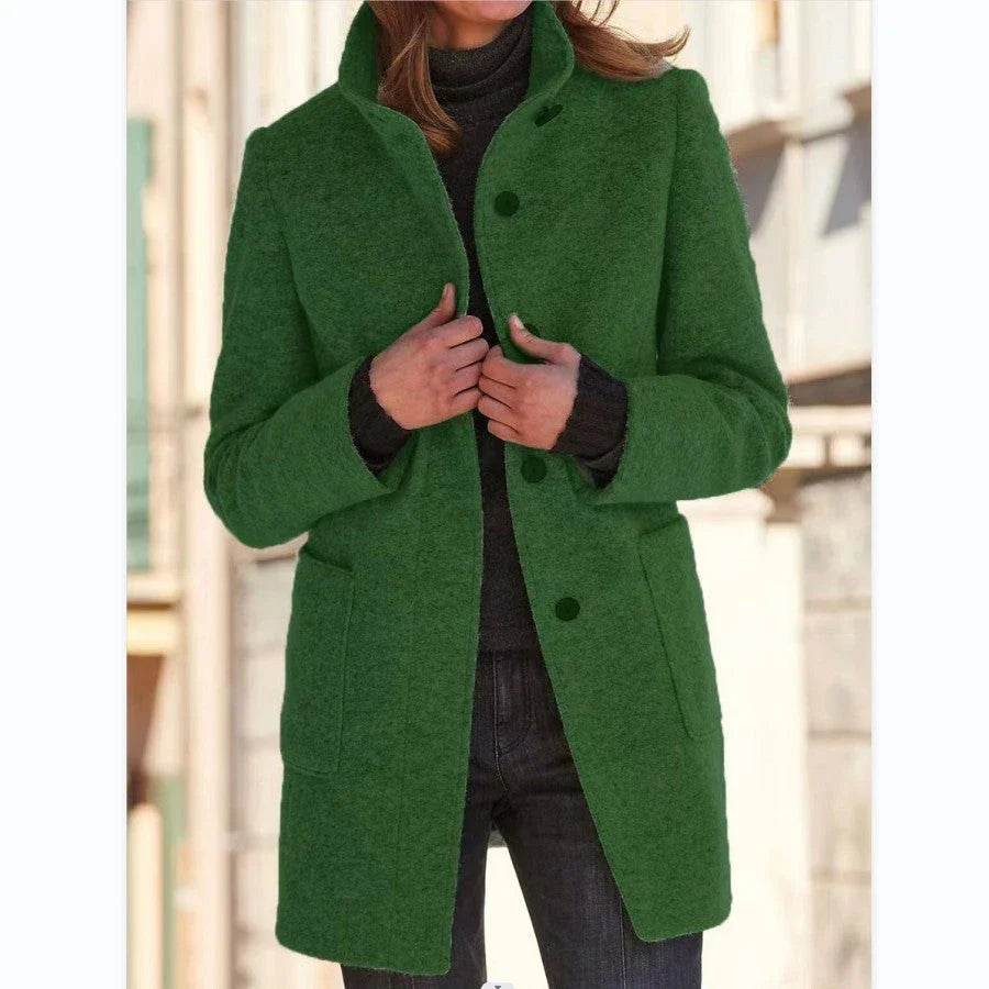 Stylish wool coat with stand collar, pockets, and slim fit design for casual winter wear.