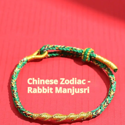 Woven eight-strand hand strap in zodiac-themed colours with flexible wire construction