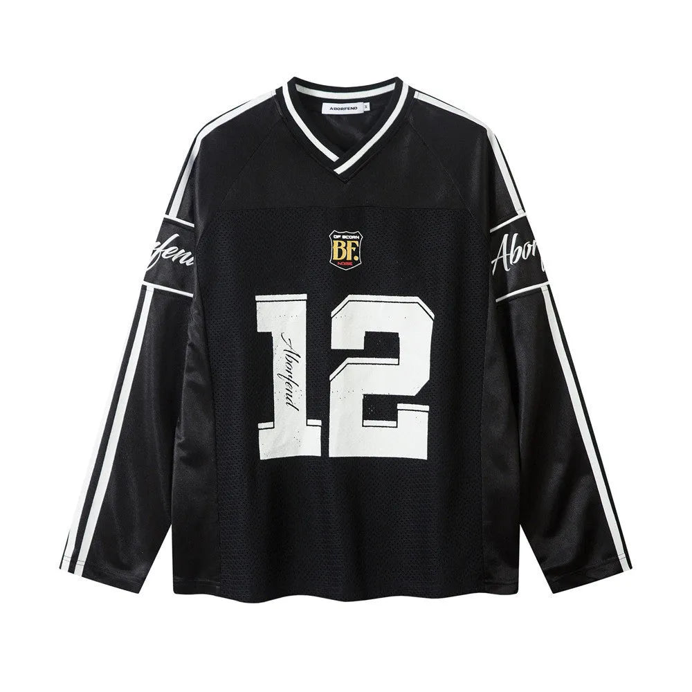 Man's black loose fit long sleeve t-shirt with a digital print design and V-neck.