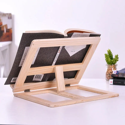 Large wooden reading book easel in pine with iron clamp, 31x24 cm, holding an open book on a desk