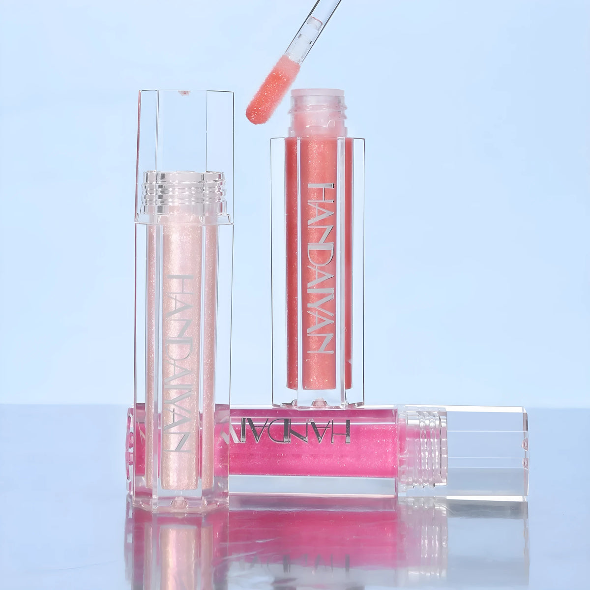 Set of six pearlescent lip lacquer tubes in shades 01 to 06, 1.8ml each.