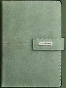 A5 notebook with imitation leather cover in colour options including black, red, green, blue, and orange.