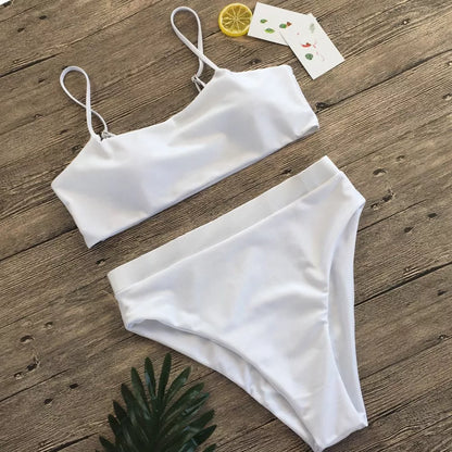 Ladies' three-point bikini swimsuit in solid colour with chest pad