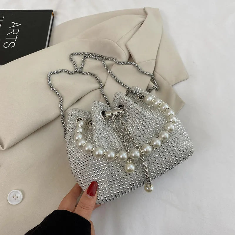 Diamond-patterned soft PU shoulder bag with detachable chain strap in bucket shape with internal organisers