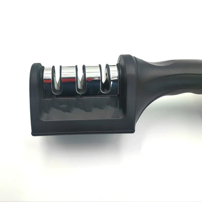 Compact 12cm plastic kitchen knife sharpener with tungsten slots for quick edge restoration, weighs 150g
