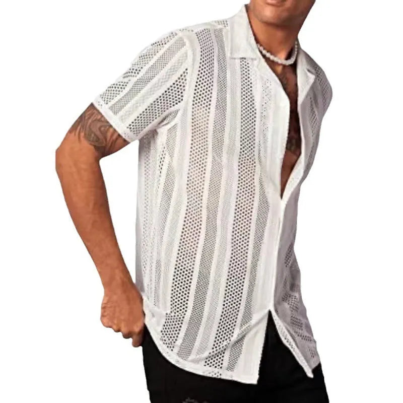 Man wearing a black short-sleeved knitted button-up shirt with a jacquard textured pattern.