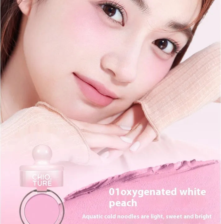 Compact of nude shimmer powder blush for contouring in four shades.